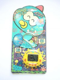 Rakuraku Dino kun Dinkie dino virtual giga pet yellow New