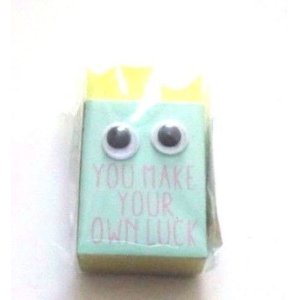 Photo: Eraser Toy Yellow You Make Your Own Luck Brand New