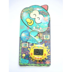 Photo: Rakuraku Dino kun Dinkie dino virtual giga pet yellow New