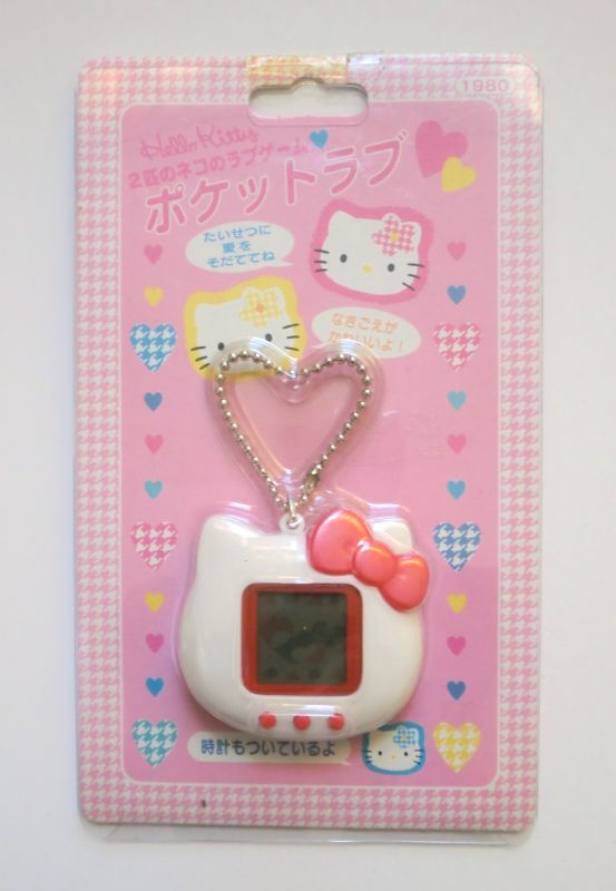 Тамагочи kitty. Тамагочи hello Kitty тамагочи. Тамагочи hello Kitty цветной. Tamagotchi Smart Sanrio. Часы тамагочи hello Kitty.